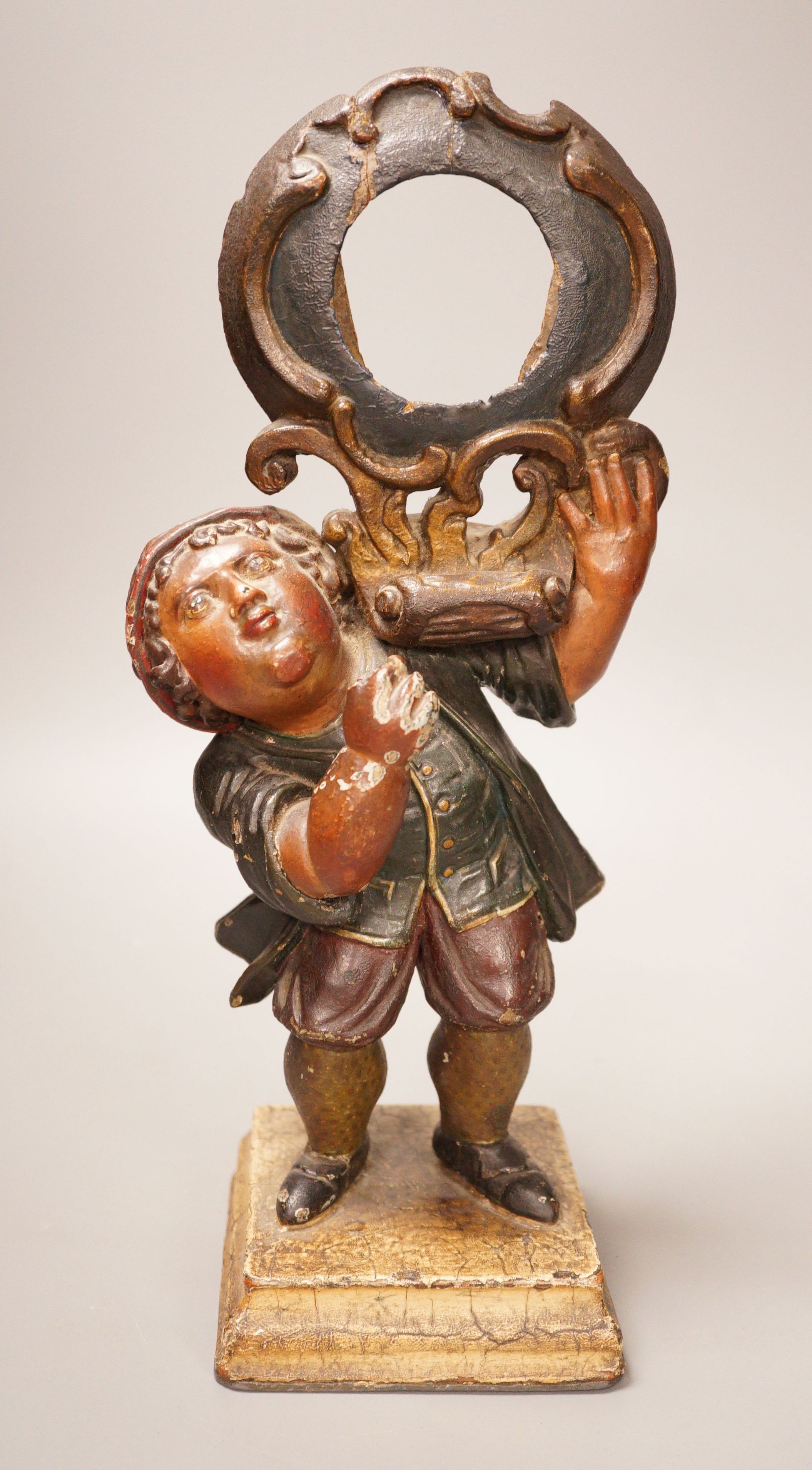 A 19th century French painted wood and composition figural watch stand, 33cm
